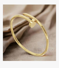Iconic Gold Nail Wrap Bangle – Chic Modern Jewelry